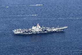 Aircraft Carrier Shandong Sailing In Hong Kong Waters
