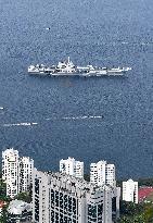 Aircraft Carrier Shandong Sailing In Hong Kong Waters