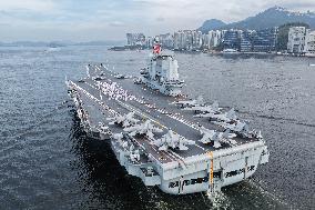 Aircraft Carrier Shandong Sailing In Hong Kong Waters