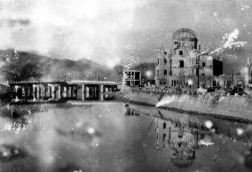 Wrecked Hiroshima Prefectural Industrial Promotion Hall (now the A-bomb Dome) and Aioi Bridge