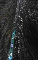 Tourists Take Feather-Shaped Boats - China