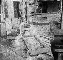 Barbershop with the window frame blown off