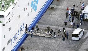 Evacuation from quake-hit island