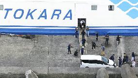 Evacuation from quake-hit island