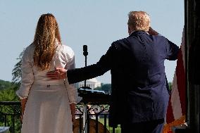 Trump Signs Tax Bill And Watches July 4th Parade
