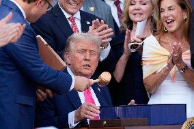 Trump Signs Tax Bill And Watches July 4th Parade