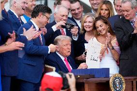 Trump Signs Tax Bill And Watches July 4th Parade