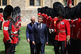 Emmanuel And Brigitte Macron Attend Welcoming Ceremony - Windsor