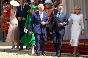 Emmanuel And Brigitte Macron Attend Welcoming Ceremony - Windsor