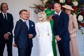 Emmanuel And Brigitte Macron Attend Welcoming Ceremony in Windsor