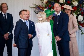 Emmanuel And Brigitte Macron Attend Welcoming Ceremony in Windsor