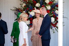 Emmanuel And Brigitte Macron Attend Welcoming Ceremony in Windsor