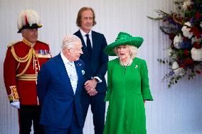 Emmanuel And Brigitte Macron Attend Welcoming Ceremony in Windsor