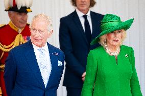 Emmanuel And Brigitte Macron Attend Welcoming Ceremony in Windsor