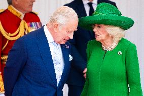 Emmanuel And Brigitte Macron Attend Welcoming Ceremony in Windsor