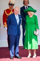 Emmanuel And Brigitte Macron Attend Welcoming Ceremony in Windsor