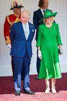 Emmanuel And Brigitte Macron Attend Welcoming Ceremony in Windsor