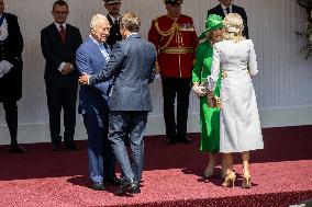 Emmanuel And Brigitte Macron Attend Welcoming Ceremony in Windsor