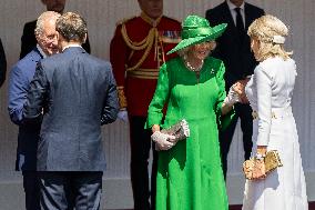 Emmanuel And Brigitte Macron Attend Welcoming Ceremony in Windsor