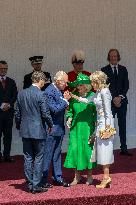 Emmanuel And Brigitte Macron Attend Welcoming Ceremony in Windsor