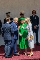 Emmanuel And Brigitte Macron Attend Welcoming Ceremony in Windsor