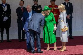 Emmanuel And Brigitte Macron Attend Welcoming Ceremony in Windsor