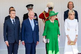 Emmanuel And Brigitte Macron Attend Welcoming Ceremony in Windsor