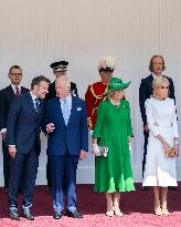 Emmanuel And Brigitte Macron Attend Welcoming Ceremony in Windsor