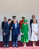 Emmanuel And Brigitte Macron Attend Welcoming Ceremony in Windsor