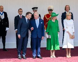 Emmanuel And Brigitte Macron Attend Welcoming Ceremony in Windsor