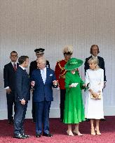 Emmanuel And Brigitte Macron Attend Welcoming Ceremony in Windsor