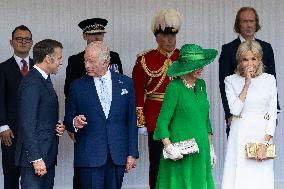 Emmanuel And Brigitte Macron Attend Welcoming Ceremony in Windsor