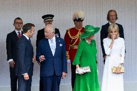 Emmanuel And Brigitte Macron Attend Welcoming Ceremony in Windsor