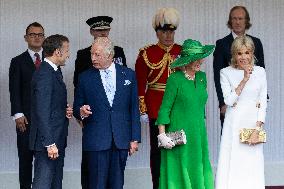 Emmanuel And Brigitte Macron Attend Welcoming Ceremony in Windsor