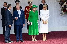Emmanuel And Brigitte Macron Attend Welcoming Ceremony in Windsor