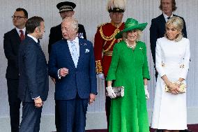 Emmanuel And Brigitte Macron Attend Welcoming Ceremony in Windsor