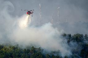 Air Rescue Operations During a Mountain Fire - Italy