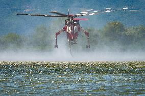 Air Rescue Operations During a Mountain Fire - Italy