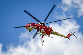 Air Rescue Operations During a Mountain Fire - Italy
