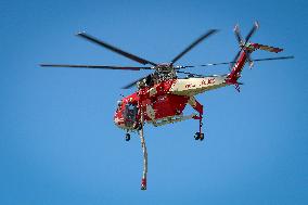 Air Rescue Operations During a Mountain Fire - Italy