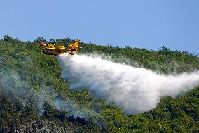 Air Rescue Operations During a Mountain Fire - Italy