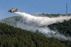 Air Rescue Operations During a Mountain Fire - Italy