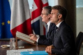 Starmer and Macron During a Visioconference With NATO Leaders - London