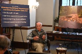 United States Senator Peter Welch (Democrat of Vermont) gives pen and pad on reformation of FEMA