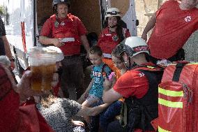 Citizens Receive First Aid Following Russian Strike - Ukraine