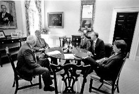 Clinton Meets Advisors