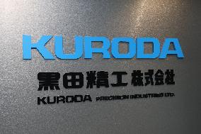 Kuroda Precision Industries signage and logo