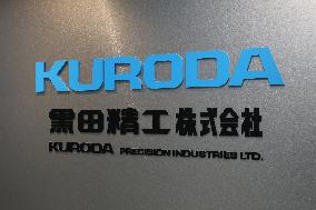 Kuroda Precision Industries signage and logo