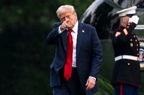 President Donald Trump Returns to the White House in Washington, DC