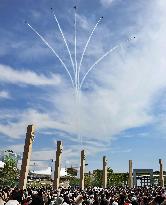 Blue Impulse aerobatic team flies over Osaka